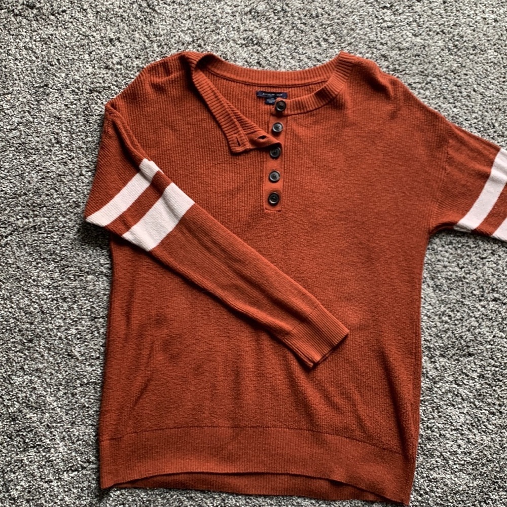 Cute maroon knit American Eagle sweater with striped sleeve detail, barely worn
